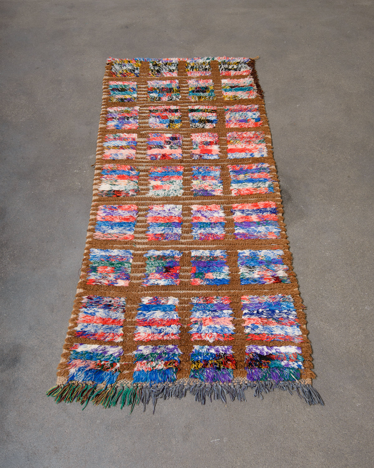 Modern, designer, handcrafted Berber runner rug from Morocco. Beniourain carpet with beautiful colours and patterns and fluffy wool texture.
